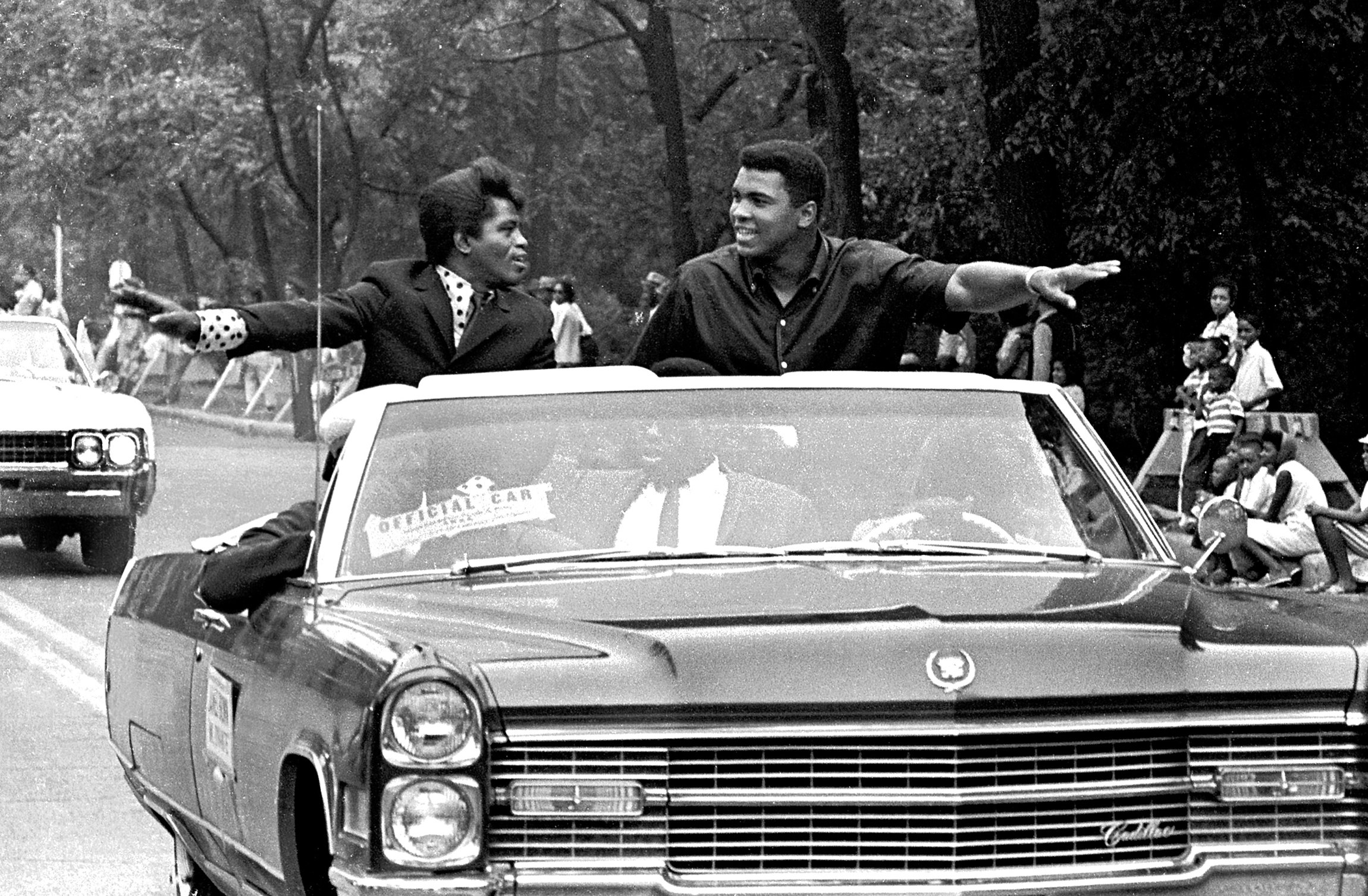 James Brown and boxing champ Cassius Clay (soon to be known as Muhammad Ali) at the annual Bud Billiken Parade, Chicago, August 1966. Photo by Robert Abbott Sengstacke/Getty Images.